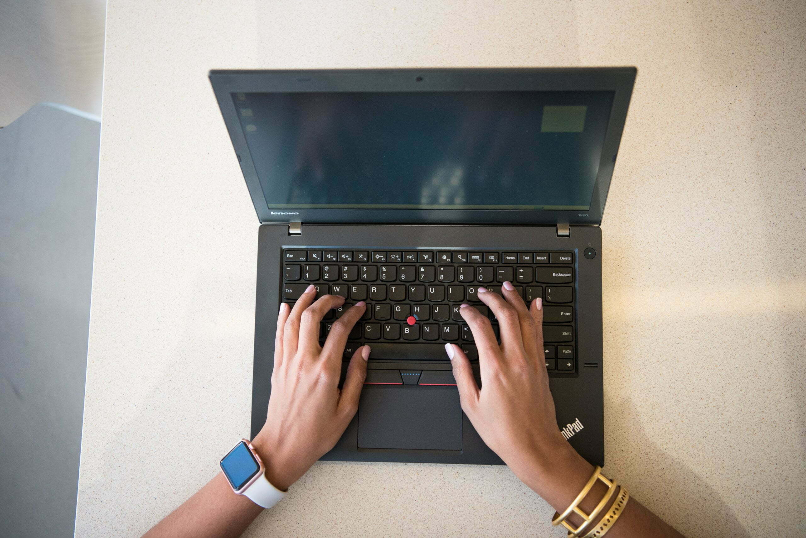 a person's feet on a keyboard