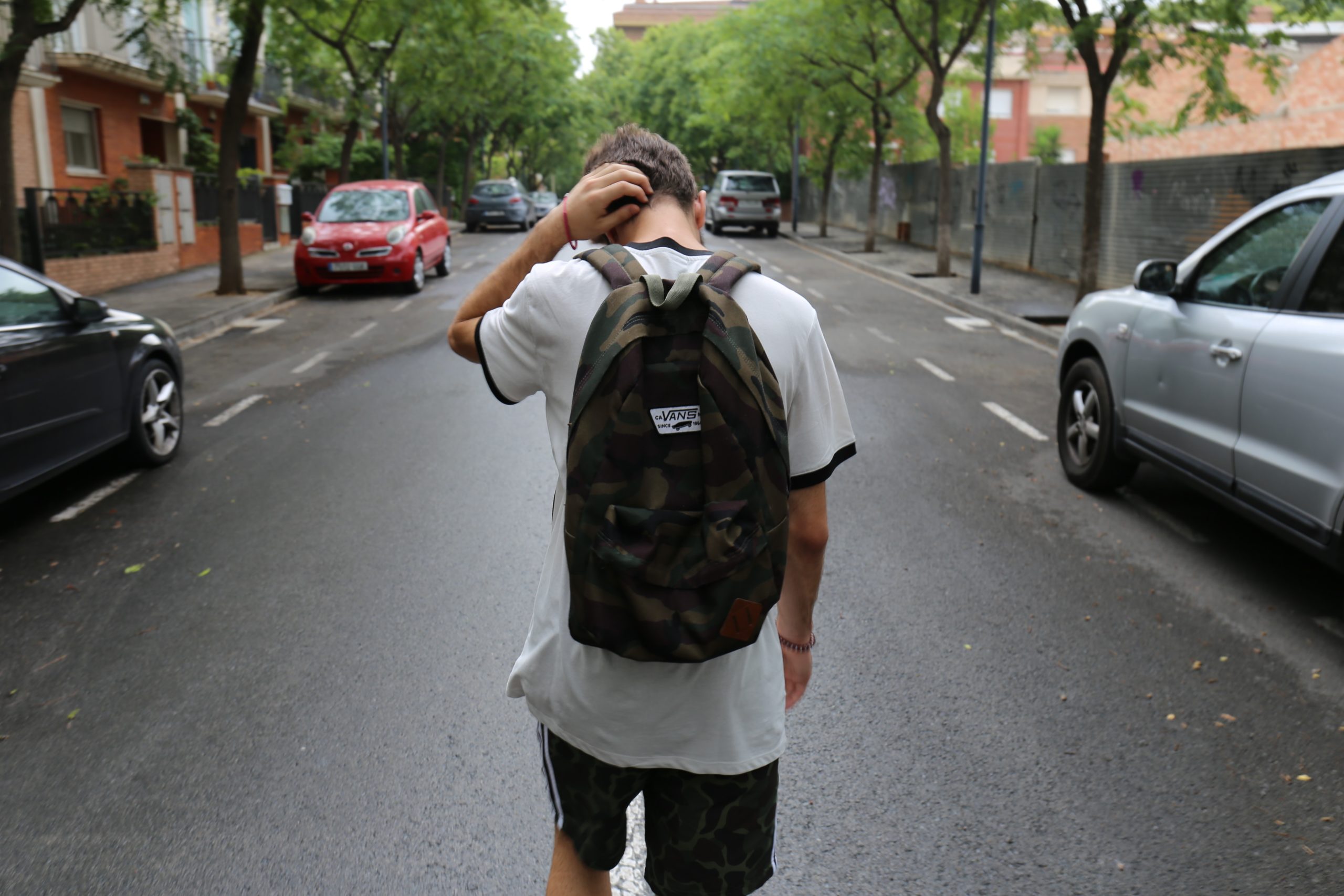 a man and a woman walking down a street