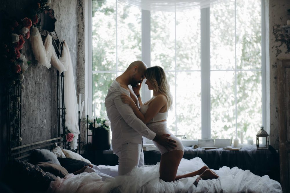 a man and woman kissing