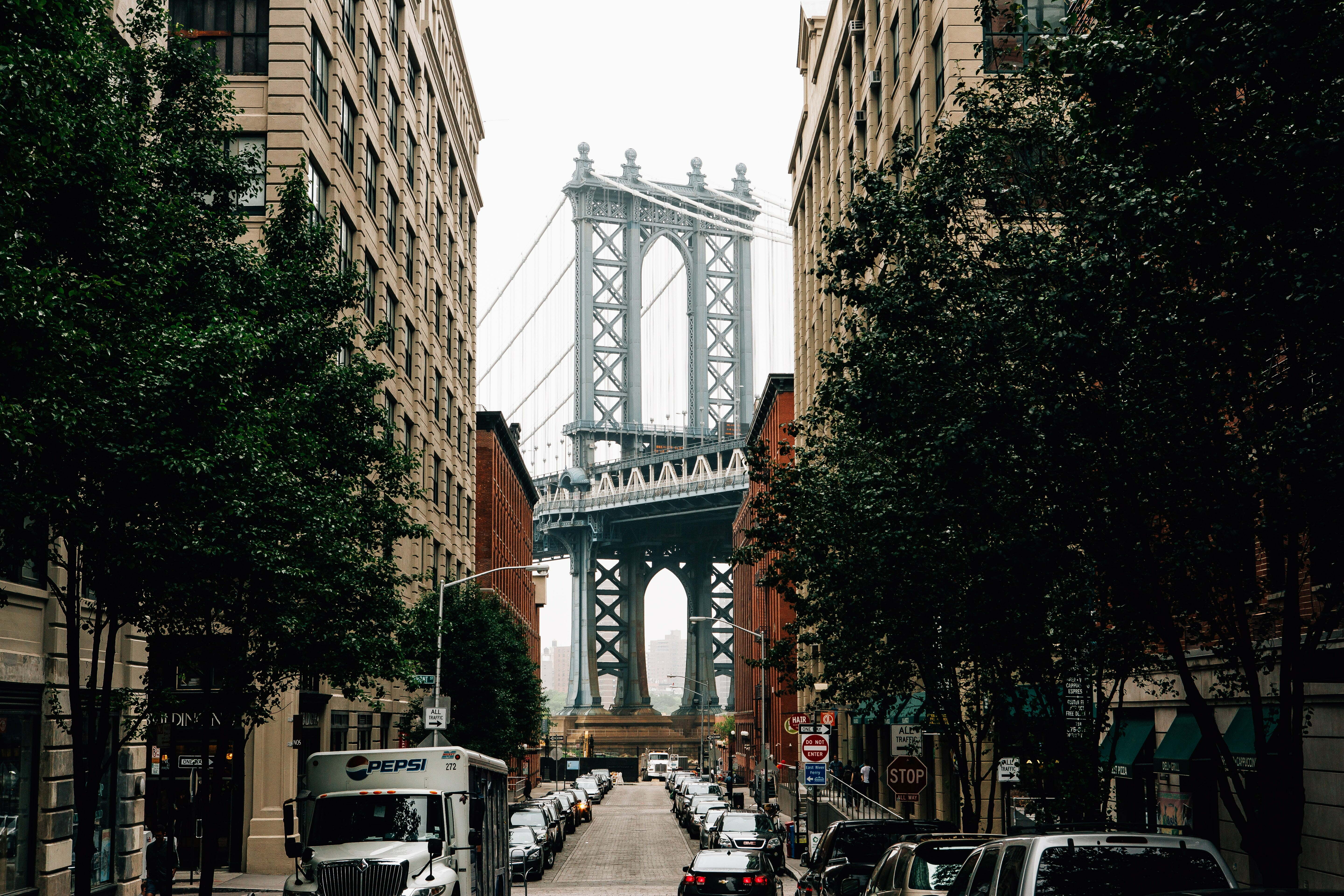 a street with cars and buildings