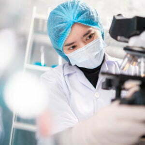 Health care researchers working in life science laboratory, medical science technology research